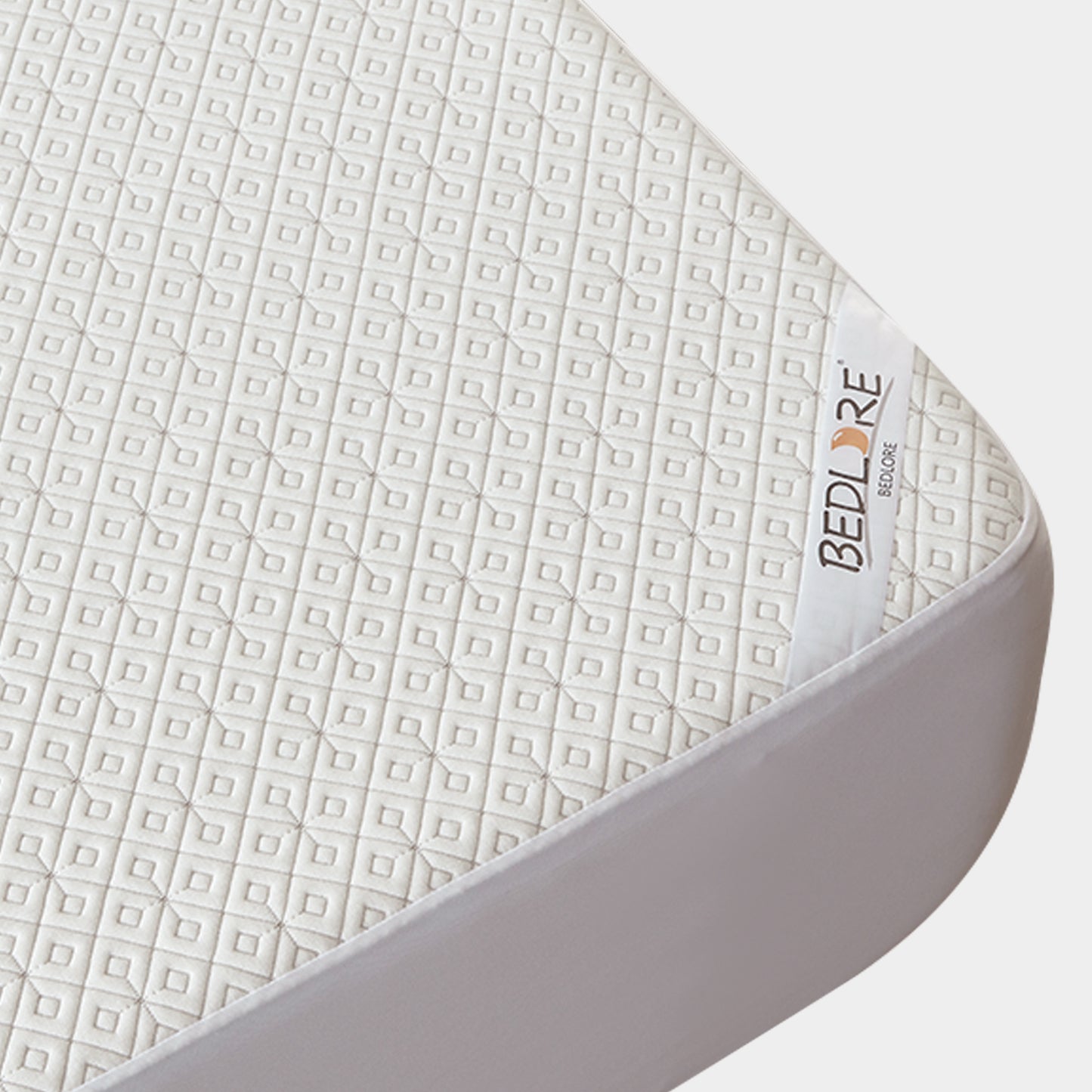 the prismatic print detail of this waterproof mattress protector, white